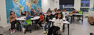 Young pupils in class