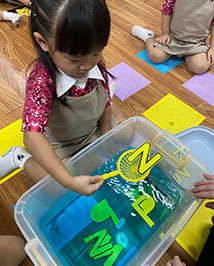 A child playing with shapes A child playing with shapes