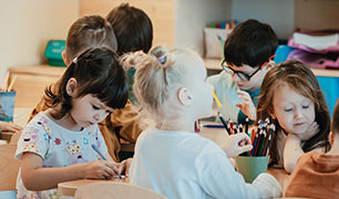 Children in class drawing Children in class drawing