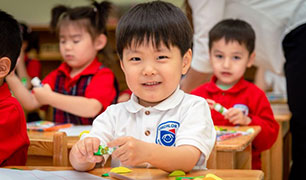 A child smiling in class A child smiling in class