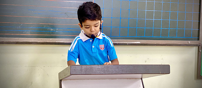 Young person at a podium