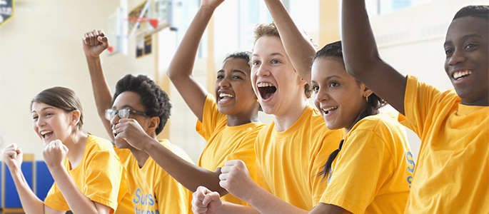 Students cheering classmates during wellbeing classes