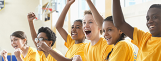 Students cheering classmates during wellbeing classes 